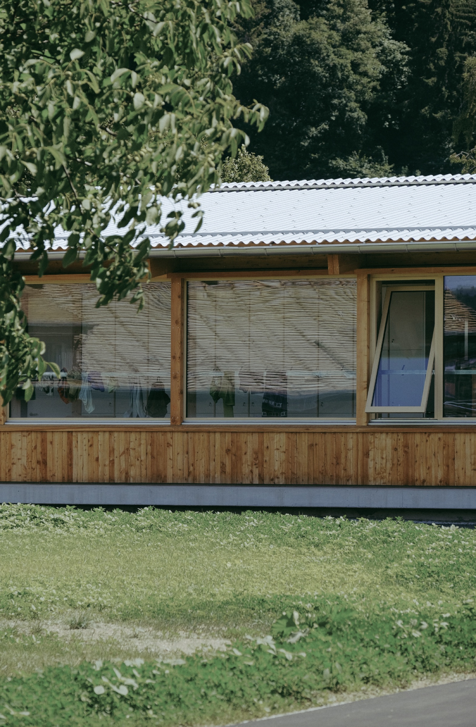 Glarisegg timber pavilion seen across the garden